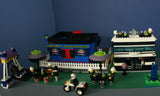 UNIQUE CUSTOM LEGO SET WITH 1905 PCS, 24 MINIFIGURES, 4 BUILDINGS: GRINGOTTS GOURMET CAFÉ WITH OUTDOOR TABLES & UMBRELLAS, CITY BANK, STORAGE BLD, PUBLIC BATHROOM, FIRE BRIGADE, TRUCKS, PLAYGROUND, GARDENS, MOTOCYCLES ETC (KIT 22)