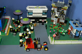 UNIQUE CUSTOM LEGO SET WITH 1905 PCS, 24 MINIFIGURES, 4 BUILDINGS: GRINGOTTS GOURMET CAFÉ WITH OUTDOOR TABLES & UMBRELLAS, CITY BANK, STORAGE BLD, PUBLIC BATHROOM, FIRE BRIGADE, TRUCKS, PLAYGROUND, GARDENS, MOTOCYCLES ETC (KIT 22)