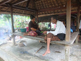 Older Ethnic one of a kind Basket with Incredible Minute Weave, a hand woven betel nut storage Container, including a Sirih Bone & wood Pounder, a Pestle called Pelacok, used to crush the betel nut, from Lombok, Lesser Sunda Islands, Indonesia