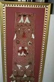 VERY RARE EARLY 1900’S ANTIQUE TEXTILE COLLECTIBLE: OLD  BALINESE HAND WOVEN HAND EMBROIDERED LAMAK WITH GERINGSING DOUBLE IKAT ATTACHED USED TO DRESS TEMPLE STATUES DURING RELIGIOUS CEREMONY FRAMED  IN UNIQUE HAND PAINTED FRAME  30 ¼”x 12 1/4” COLLECTOR
