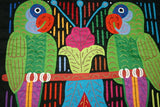 A Framed Kuna Indian Folk Art Mola from San Blas Islands, Panama in Hand Painted Frame With Wood Leaves, Glass & Double Mats. Hand stitched  Applique: Green Parrots On a Perch 20.5" X 17.5" (DFM20) WALL DECOR