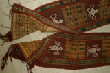 Hand woven ceremonial Sumba Hinggi Ikat Songket Textile 55"x 13.25" Geometric Designs. Handspun Cotton Tapestry, Dyed with Natural Pigments. Adorned with Symbolic Insect Motifs Created with Hand sewn tiny Nassa Shells (SR26) red rust background