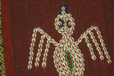 Hand woven ceremonial Sumba Hinggi Ikat Songket Textile 55"x 13.25" Geometric Designs. Handspun Cotton Tapestry, Dyed with Natural Pigments. Adorned with Symbolic Insect Motifs Created with Hand sewn tiny Nassa Shells (SR26) red rust background