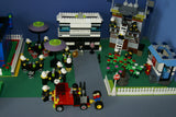 UNIQUE CUSTOM LEGO SET WITH 1905 PCS, 24 MINIFIGURES, 4 BUILDINGS: GRINGOTTS GOURMET CAFÉ WITH OUTDOOR TABLES & UMBRELLAS, CITY BANK, STORAGE BLD, PUBLIC BATHROOM, FIRE BRIGADE, TRUCKS, PLAYGROUND, GARDENS, MOTOCYCLES ETC (KIT 22)