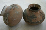 1980 Primitive Hand Crafted Vermasse Terracotta Pottery, Vessel from East Timor Island, Indonesia: 3D Raised Relief Decorative Motifs of man & gecko colored with natural earthtone Pigments 9" x 8" (28" Diameter) P29A