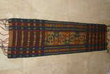 Hand woven Ceremonial Sumba Songket Hinggi Ikat long Textile Runner with Geometric Designs Made with Hand spun Cotton Dyed with Natural Pigments (SR69) colorful rust red, dark blue, green & gold decorative table runner wall hanging wrap
