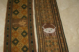 Hand woven Sumba Hinggi Songket Ikat Textile (49" x 13") Made from Hand spun Cotton, Dyed with Natural Pigments. INTRICATE GEOMETRIC DESIGNS  Adorned with Crab MOTIF Created with Nassa Shells (49" x 13") SR43 RUST RED GOLDS GREENS