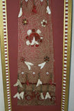 VERY RARE EARLY 1900’S ANTIQUE TEXTILE COLLECTIBLE: OLD  BALINESE HAND WOVEN HAND EMBROIDERED LAMAK WITH GERINGSING DOUBLE IKAT ATTACHED USED TO DRESS TEMPLE STATUES DURING RELIGIOUS CEREMONY FRAMED  IN UNIQUE HAND PAINTED FRAME  30 ¼”x 12 1/4” COLLECTOR