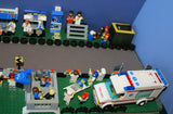 UNIQUE HUGE CUSTOM LEGO SET (1032 PCS): 41 MINIFIGURES (YEAR 1978 & ON), RACE TRACK, FINISH LINE, MULTIPLE BLEACHERS, 6 CARS, SNACK BAR, HELMET SHOP, GAS PUMP, AMBULANCE, REPORTERS, HOT DOG CART, MULTIPLE ACCESSORIES ETC... (KIT 10) 32" X 12"