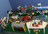 UNIQUE HUGE CUSTOM LEGO SET (1032 PCS): 41 MINIFIGURES (YEAR 1978 & ON), RACE TRACK, FINISH LINE, MULTIPLE BLEACHERS, 6 CARS, SNACK BAR, HELMET SHOP, GAS PUMP, AMBULANCE, REPORTERS, HOT DOG CART, MULTIPLE ACCESSORIES ETC... (KIT 10) 32" X 12"