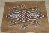 Rare Tapa Bark Cloth (Kapa in Hawaii), from Lake Sentani, Irian Jaya, Papua New Guinea. Hand painted by a Tribal Artist with natural pigments: Spiritual Stylized Motifs of shields with eyes & fish. 21" x 17" (no 28)