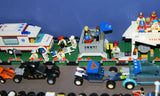 UNIQUE HUGE CUSTOM LEGO SET (1032 PCS): 41 MINIFIGURES (YEAR 1978 & ON), RACE TRACK, FINISH LINE, MULTIPLE BLEACHERS, 6 CARS, SNACK BAR, HELMET SHOP, GAS PUMP, AMBULANCE, REPORTERS, HOT DOG CART, MULTIPLE ACCESSORIES ETC... (KIT 10) 32" X 12"