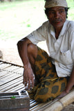 Older Ethnic one of a kind Basket with Incredible Minute Weave, a hand woven betel nut storage Container, including a Sirih Bone & wood Pounder, a Pestle called Pelacok, used to crush the betel nut, from Lombok, Lesser Sunda Islands, Indonesia