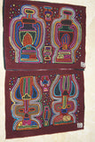Kuna Indian folk Art Mola Blouse Panel from San Blas Island Panama: Hand stitched Reverse Applique:  Colorful Abstract Oil Lamp Motif 16.75" x 13" (61B)