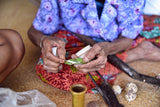 Older Ethnic one of a kind Basket with Incredible Minute Weave, a hand woven betel nut storage Container, including a Sirih Bone & wood Pounder, a Pestle called Pelacok, used to crush the betel nut, from Lombok, Lesser Sunda Islands, Indonesia