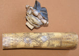 Older Timor Ethnic Authentic Tribal Lime Container (used during Betel Habit): Hand Carved Buffalo Bone receptacle with hand etched stylized Scrimshaw motifs of geckos, Hand Carved frog Wood stopper with Nassa Shells & Rattan Weave BN3