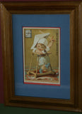 EPHEMERA AMERICANA WHIMSICAL ART: 1800's FRAMED ANTIQUE VICTORIAN ADVERTISING TRADE CARD: MILK-MAID BRAND SOLDIER TOT (DFPO1P) CUTE BABY BOY DESIGNER COLLECTOR COLLECTIBLE WALL DÉCOR UNIQUE