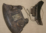 HAND CARVED WOODEN BETEL QUID CONTAINER PURSE, TORAJA PEOPLE, SULAWESI.  BETEL LIME HABIT RECEPTACLE WITH MOTIFS OF ANCESTORS & BUFFALO BONE DECORATIONS CREATED IN THE SHAPE OF TRADITIONAL TONGKONAN HOUSES. COLLECTED IN THE FIELD