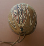 BETEL PARAPHERNALIA: ETHNIC VERY RARE PRIMITIVE LIME GOURD, HAND PAINTED TRADITIONAL MOTIFS CREATED WITH NATURAL PIGMENTS (CHARCOAL & LIME), COLLECTED ON THE PREMISES, LAKE SENTANI, WEST PAPUA, IRIAN JAYA, LATE 1900'S.