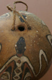 BETEL PARAPHERNALIA: ETHNIC VERY RARE PRIMITIVE LIME GOURD, HAND PAINTED TRADITIONAL MOTIFS CREATED WITH NATURAL PIGMENTS (CHARCOAL & LIME), COLLECTED ON THE PREMISES, LAKE SENTANI, WEST PAPUA, IRIAN JAYA, LATE 1900'S.