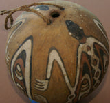 BETEL PARAPHERNALIA: ETHNIC VERY RARE PRIMITIVE LIME GOURD, HAND PAINTED TRADITIONAL MOTIFS CREATED WITH NATURAL PIGMENTS (CHARCOAL & LIME), COLLECTED ON THE PREMISES, LAKE SENTANI, WEST PAPUA, IRIAN JAYA, LATE 1900'S.
