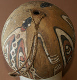 BETEL PARAPHERNALIA: ETHNIC VERY RARE PRIMITIVE LIME GOURD, HAND PAINTED TRADITIONAL MOTIFS CREATED WITH NATURAL PIGMENTS (CHARCOAL & LIME), COLLECTED ON THE PREMISES, LAKE SENTANI, WEST PAPUA, IRIAN JAYA, LATE 1900'S.