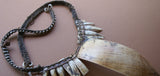 EXTREMELY RARE YALI TRIBE (CANNIBAL) “BIG MAN” MIKAK TRIDACNA GIGAS NECKLACE WITH WOVEN BARK HAND-TWISTED TWINE, VALUABLE CURRENCY, HIGHLANDS, CENTRAL IRIAN JAYA, WEST NEW GUINEA, MID-20th CENTURY, CIRCA 1960’S, PRIVATE COLLECTION