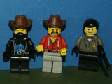 9 NOW RARE WESTERN COWBOYS RETIRED MINIFIGURES FROM KIT 6755 (1996) IN GOOD CONDITION, D0G, 12 CUSTOM BUILDS, PINE TREES, THRONE, ATTACK TRACTOR, PADDLE BOAT, ROBOT, FOOD STAND, BENCH, PULPIT ETC.. TOTAL PIECES: 265 PCS. KIT No 75