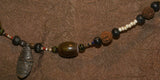 Unique Vintage Hand crafted Ethnic Amber & Glass Trade Beads, Rudhaccha Seeds Necklace with Buffalo Bone Hand Carved Pendant of Protective Ancestor Effigy for Good Luck, Health & Prosperity, Borneo Kalimantan, Indonesia NECK19 + 1 Coconut necklace.