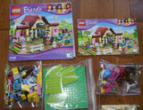 Now Rare Retired LEGO Friends, Kit 3189. (414 PIECES) Heartlake Stables: Barn with 2 Minifigures, 2 horses, Cat, Frog, Practice Jumps, Helmets, Saddles & Plenty of Accessories (Age: 6 - 12 years) Manuels & Box Included YEAR 2012