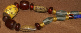 Rare Tribal Ethnic Dayak Iban Tribe Talisman Necklace: Antique Hand Crafted Magical Lukut Sekala , Old Trade Glass Beads, Amber beads, Buffalo Bone Hand Etched Beads, Shells, Chinese Coins, collected in 1980’s Borneo Aristocrat Owner, Indonesia. NB4