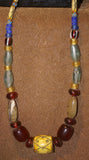 Rare Tribal Ethnic Dayak Iban Tribe Talisman Necklace: Antique Hand Crafted Magical Lukut Sekala , Old Trade Glass Beads, Amber beads, Buffalo Bone Hand Etched Beads, Shells, Chinese Coins, collected in 1980’s Borneo Aristocrat Owner, Indonesia. NB4