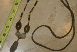 Unique Earthtones Hand crafted Ethnic Glass Trade Beads Necklace with Buffalo Bone Hand Carved Pendant of Protective Ancestor for Good Luck, Borneo Kalimantan, Indonesia NECK32 + 1 Flapper Coconut necklace.