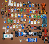 UNIQUE HUGE CUSTOM LEGO SET (1032 PCS): 41 MINIFIGURES (YEAR 1978 & ON), RACE TRACK, FINISH LINE, MULTIPLE BLEACHERS, 6 CARS, SNACK BAR, HELMET SHOP, GAS PUMP, AMBULANCE, REPORTERS, HOT DOG CART, MULTIPLE ACCESSORIES ETC... (KIT 10) 32" X 12"