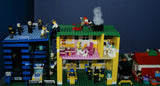 HUGE CUSTOM LEGO SET 32" x 12" x 15": THE ULTIMATE YEAR ROUND CHRISTMAS VILLAGE (2136 PCS) WITH 81 MINIFIGURES & 4 BUILDINGS, POLICE STATION, INDOOR POOL, OFFICES, WAREHOUSE, APTS, CARS, MOTOCYCLES, GARDENS, SANTAS & ACCESSORIES (KIT 27)
