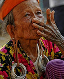 Unique Vintage Earthtones Hand crafted Ethnic Amber & Glass Trade Beads Necklace with Buffalo Bone Hand Carved Pendant of Protective Ancestor Effigy for Good Luck, Health & Prosperity, Borneo Kalimantan, Indonesia NECK18 + 1 Flapper Coconut necklace.