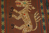 Hand woven Ceremonial Hinggi Sumba Songket Ikat Textile 55"x 13.75" created with symbolic animal motifs & geometrics. Tapestry is Hand spun Cotton, Dyed with Natural Pigments. Horse Motif Created with Hand sewn tiny Nassa Shells (SR39) rust red background