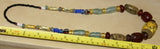 Rare Tribal Ethnic Dayak Iban Tribe Talisman Necklace: Antique Hand Crafted Magical Lukut Sekala , Old Trade Glass Beads, Amber beads, Buffalo Bone Hand Etched Beads, Shells, Chinese Coins, collected in 1980’s Borneo Aristocrat Owner, Indonesia. NB4