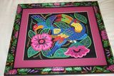 A Framed Kuna Indian Folk Art Mola from San Blas Islands, Panama. In Custom Frame, Glass & Mat. Hand stitched Textile Applique: Purple Hummingbird, Hummer & Flowers 14" X 12" (DFM11) Wall Decor