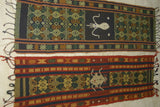 2 HANDWOVEN SUMBA HINGGI SONGKET IKAT TEXTILES FOR THE PRICE OF 1. MADE WITH HANDSPUN COTTON DYED WITH NATURAL PIGMENTS. ADORNED WITH MOTIFS CREATED WITH NASSA SHELLS SR32 (52" x 13.25") & SR33 (51" x 13")