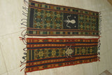 2 HANDWOVEN SUMBA HINGGI SONGKET IKAT TEXTILES FOR THE PRICE OF 1. MADE WITH HANDSPUN COTTON DYED WITH NATURAL PIGMENTS. ADORNED WITH MOTIFS CREATED WITH NASSA SHELLS SR32 (52" x 13.25") & SR33 (51" x 13")
