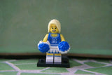 BRAND NEW, NOW RARE, RETIRED LEGO MINIFIGURE COLLECTIBLE: CHEERLEADER WITH 2 POMPOMS & BLACK BASE (Serie 1) YEAR 2009, 7 PIECES