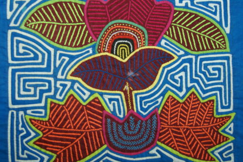 1980's Kuna Indian Folk Art Mola blouse panel from San Blas Islands, Panama. Hand-stitched Applique: Geometric Abstract Hibiscus in Bloom 11.75