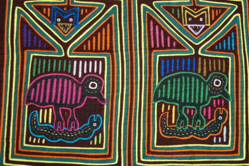 Kuna Indian Folk Art Mola blouse panel from San Blas Islands, Panama. Hand stitched Applique: Mirror Image of Birds Hunting Snake, while Spying Devils Observe 17