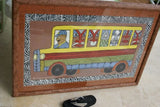 RARE UNIQUE COLORFUL  FOLK ART PAINTING PAPUA NEW GUINEA HUMOROUS ARTIST: TRIBAL WARRIORS TRAVELLING BY BUS & FRAMED IN SIGNED HAND PAINTED FRAME TO MATCH THE ART DESIGNER COLLECTOR WALL CARTOON  ART  38" X 27” HUGE DFP1