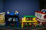 9 CUSTOM LEGO SETS (1911 pcs) WITH 58 NOW RARE RETIRED MINIFIGURES FROM LEGO TOWN (1978-2010). BUILDS: HOSPITAL, AMBULANCE, HELICOPTER, SUNSHINE CAFE, FLORIST, HOT DOG STAND, POST OFFICE, CRANE, POLICE VEHICLES, TRUCKS, ROAD, SO MANY ACCESSORIES (KIT 12)