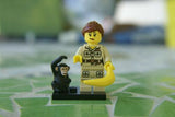 BRAND NEW, NOW RARE, RETIRED LEGO COLLECTIBLE MINIFIGURE: ZOOKEEPER, TAMER, WITH MONKEY, BANANA AND BLACK BASE (Serie 5) 8805, YEAR 2011, 7 PIECES.