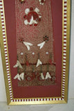 VERY RARE EARLY 1900’S ANTIQUE TEXTILE COLLECTIBLE: OLD  BALINESE HAND WOVEN HAND EMBROIDERED LAMAK WITH GERINGSING DOUBLE IKAT ATTACHED USED TO DRESS TEMPLE STATUES DURING RELIGIOUS CEREMONY FRAMED  IN UNIQUE HAND PAINTED FRAME  30 ¼”x 12 1/4” COLLECTOR