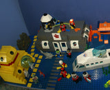 6 CUSTOM LEGO SETS TREASURE HUNT 32"X12": CRUSTY CRAB RESTAURANT, SEAWEED GARDENS, SQUIDWARD’S HOME, SANDY'S HOUSE, SPONGEBOB RETREAT, MRS PUFFS' SANDBOX (935 PCS) + 24 NOW RARE RETIRED "TOWN" DIVERS AND BIKINI BOTTOM MINIFIGURES (1978-2009) KIT 5