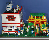 9 CUSTOM LEGO SETS (1911 pcs) WITH 58 NOW RARE RETIRED MINIFIGURES FROM LEGO TOWN (1978-2010). BUILDS: HOSPITAL, AMBULANCE, HELICOPTER, SUNSHINE CAFE, FLORIST, HOT DOG STAND, POST OFFICE, CRANE, POLICE VEHICLES, TRUCKS, ROAD, SO MANY ACCESSORIES (KIT 12)